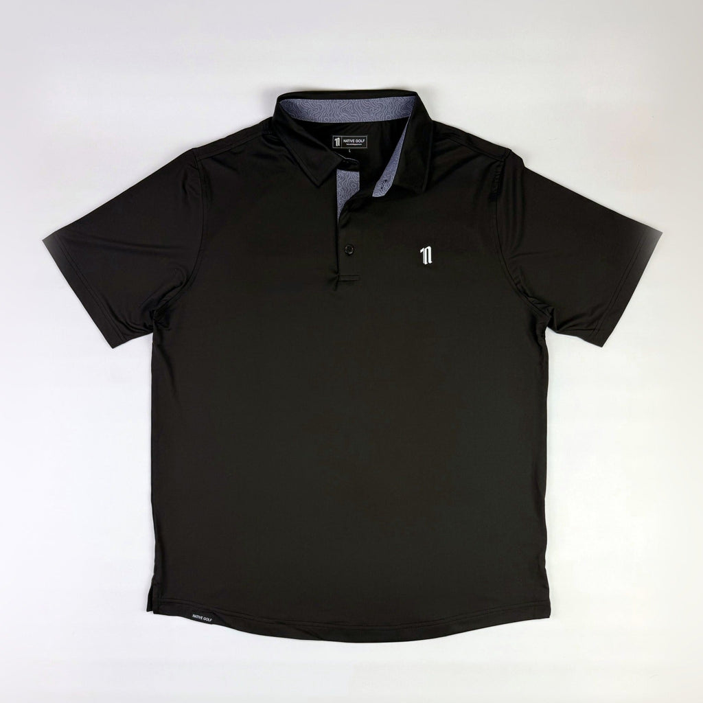 The Caddie Polo, black, laid flat front view