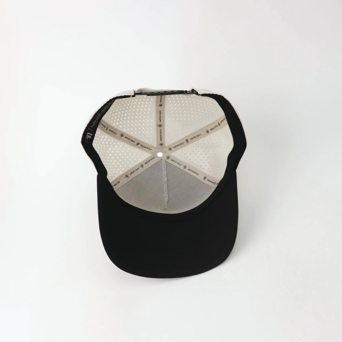 The Eagle "FULL SEND" hat, underside showing the printed taping
