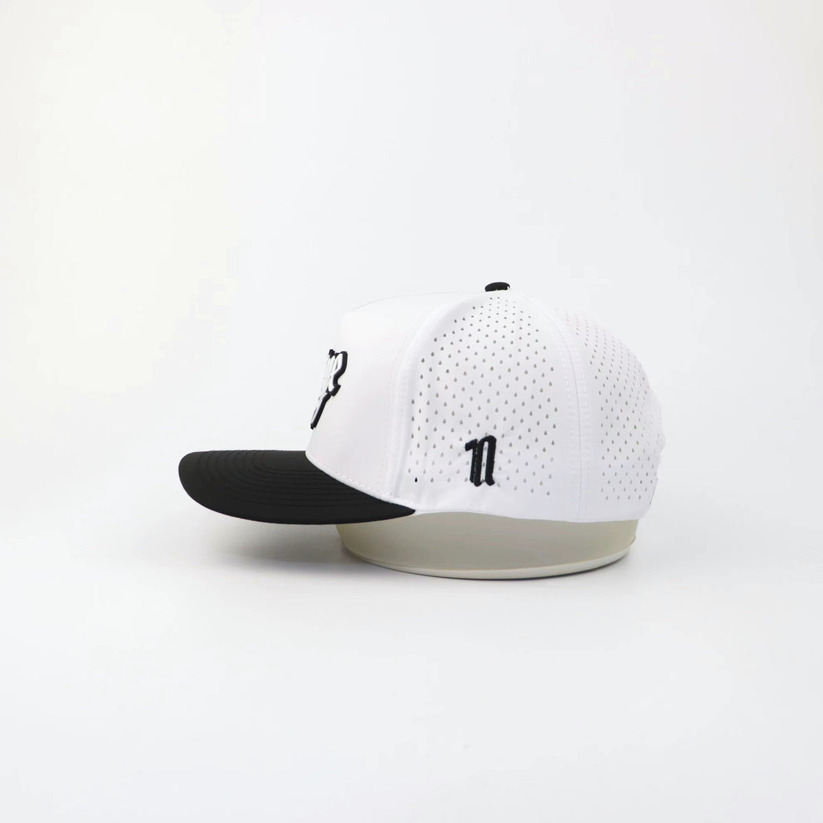 The OG "ACE" hat, side view showing the laser-cut perforations